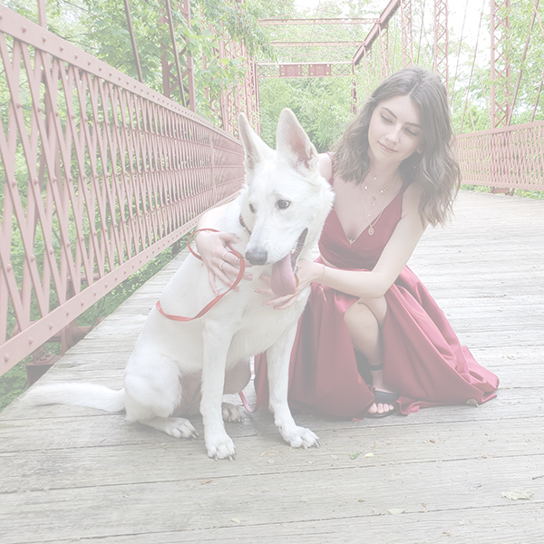 Pet owner with her dog showing the importance of pet insurance for unexpected veterinary expenses